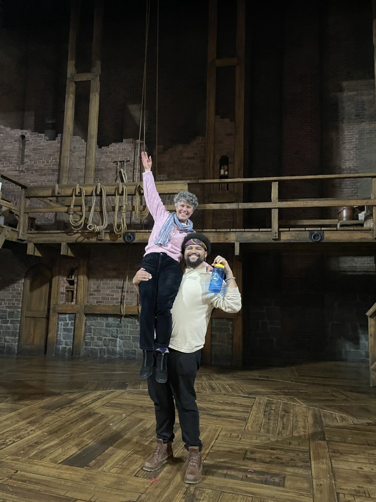 Tshikosi with Traveling Players' Founder, Jeanne E. Harrison, on the set of 'Hamilton'